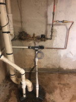 Water Commander™ tied into water line immediately after water meter